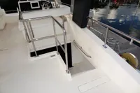 2018 Leopard 43 Powercat helm station and stairway to lower deck.