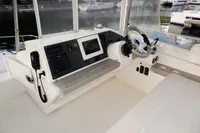 Helm station of 2018 Leopard 43 Powercat with navigation equipment and steering wheel.