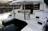 2018 Leopard 43 Powercat docked, rear view showing spacious deck and seating area.