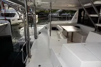 2018 Leopard 43 Powercat yacht interior with seating and dining area.