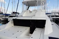 2018 Leopard 43 Powercat yacht docked at marina, rear view.