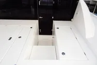 2018 Leopard 43 Powercat deck with storage compartments and access door.