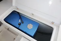 Storage compartment with blue tank in 2018 Leopard 43 Powercat.