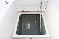 Open storage compartment on a 2018 Leopard 43 Powercat boat.