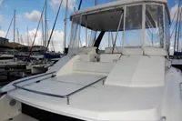 2018 Leopard 43 Powercat yacht docked at marina with clear skies.