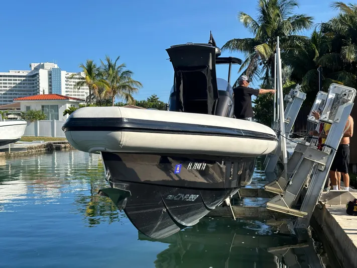  Yacht Photos Pics 2020 Technohull SEADNA 999 G5 ST boat being lifted from water at marina.