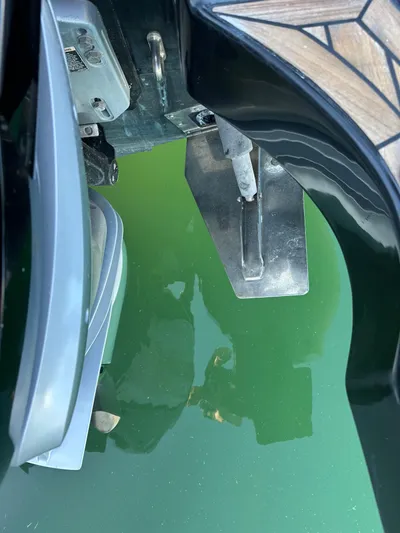  Yacht Photos Pics Outboard motor of a 2020 Technohull SEADNA 999 G5 ST in green water.