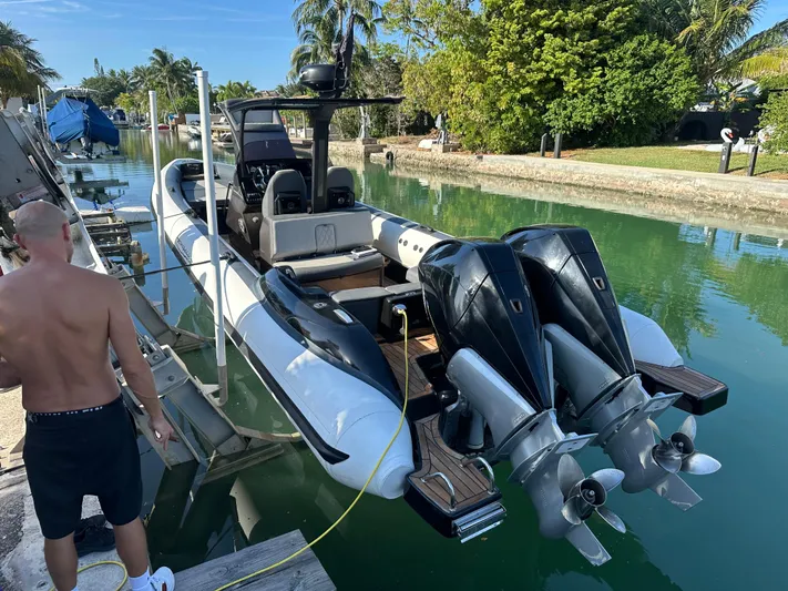  Yacht Photos Pics 2020 Technohull SEADNA 999 G5 ST boat docked in a scenic canal setting.