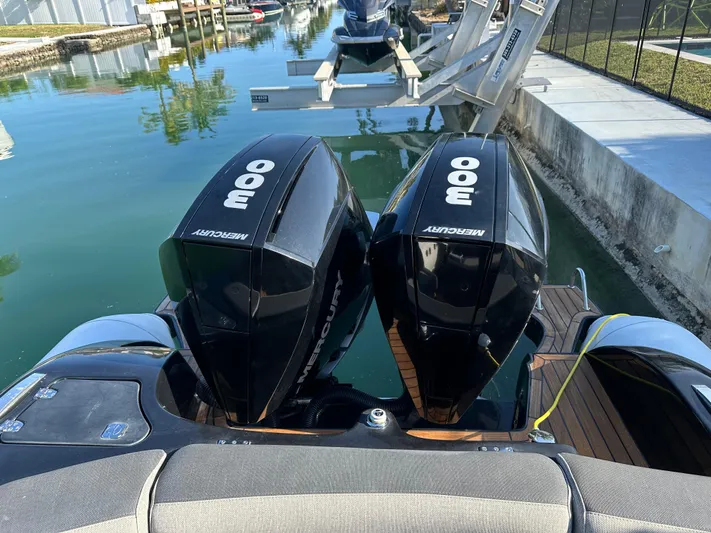 Yacht Photos Pics Twin Mercury 300 engines on a 2020 Technohull SEADNA 999 G5 ST boat docked in a marina.