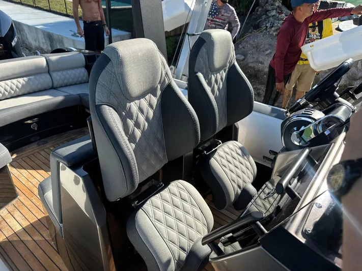  Yacht Photos Pics 2020 Technohull SEADNA 999 G5 ST boat interior with plush seating and modern dashboard.