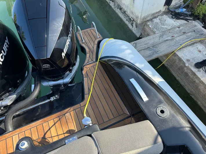  Yacht Photos Pics 2020 Technohull SEADNA 999 G5 ST boat with Mercury engines, docked on wooden platform.