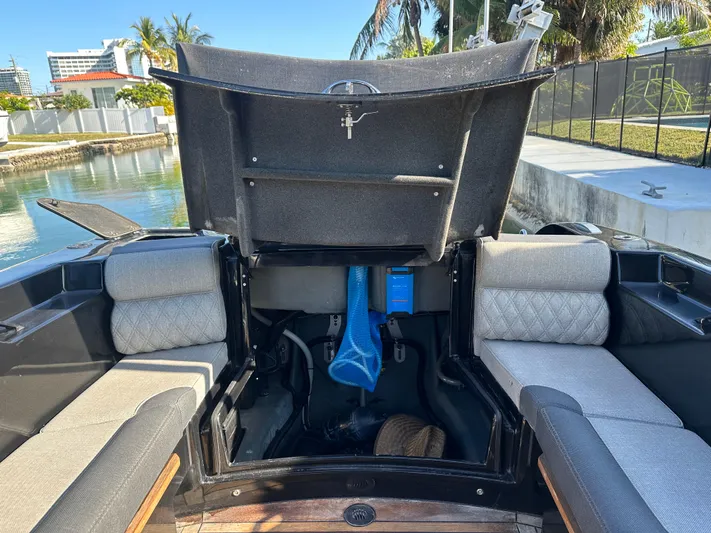  Yacht Photos Pics 2020 Technohull SEADNA 999 G5 ST boat interior with open storage compartment.