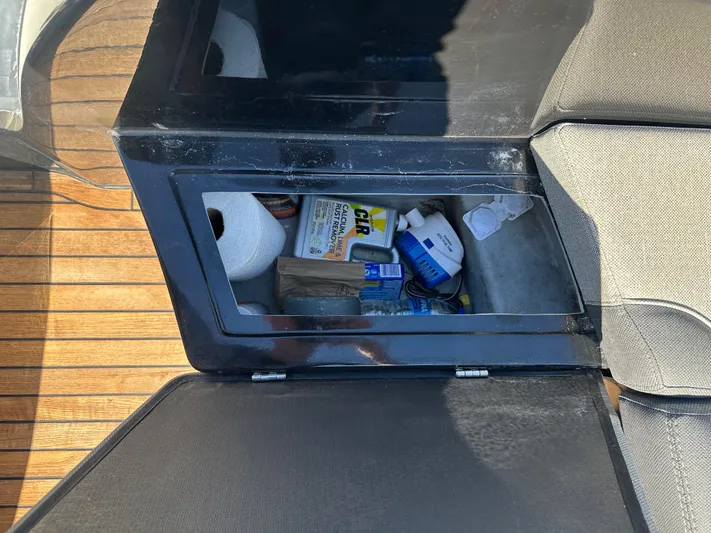  Yacht Photos Pics Storage compartment on 2020 Technohull SEADNA 999 G5 ST boat with various items inside.