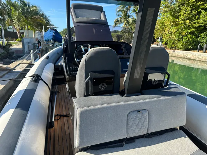  Yacht Photos Pics 2020 Technohull SEADNA 999 G5 ST boat interior with modern seating and dashboard.