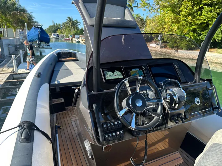  Yacht Photos Pics 2020 Technohull SEADNA 999 G5 ST boat with sleek dashboard and steering wheel.