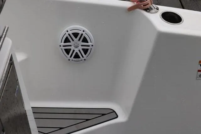  Yacht Photos Pics 2021 Four Winns V355 Coupe boat interior with speaker and cup holder.
