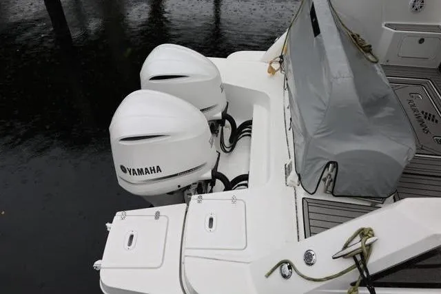 Yacht Photos Pics 2021 Four Winns V355 Coupe with dual Yamaha outboard engines, docked on water.