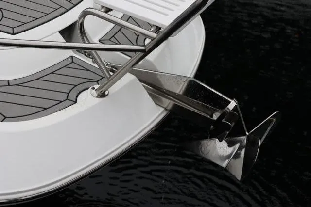  Yacht Photos Pics 2021 Four Winns V355 Coupe boat anchor and deck detail on water.