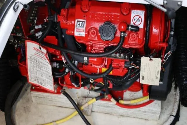  Yacht Photos Pics Engine compartment of 2021 Four Winns V355 Coupe, featuring a red EFI engine.