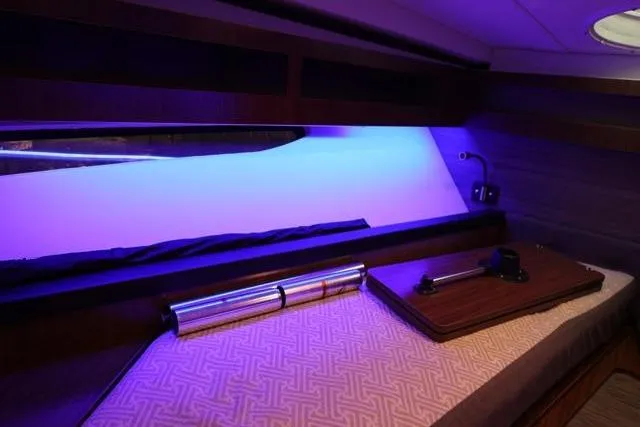  Yacht Photos Pics Interior cabin of 2021 Four Winns V355 Coupe with ambient blue lighting.