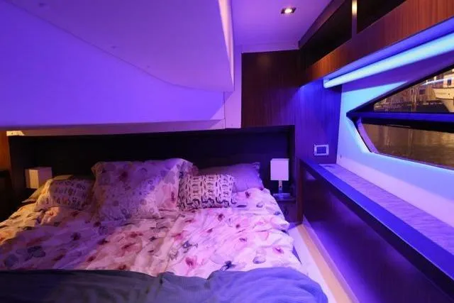  Yacht Photos Pics Luxurious cabin interior of 2021 Four Winns V355 Coupe with ambient lighting.