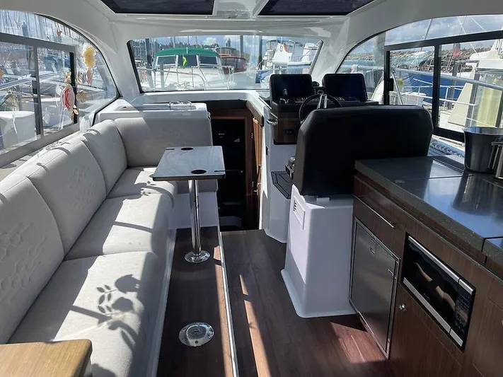  Yacht Photos Pics Interior of 2021 Four Winns Vista 355 Coupe, featuring modern seating and sleek design.