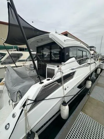  Yacht Photos Pics 2021 Four Winns Vista 355 Coupe docked, featuring sleek design and modern amenities.