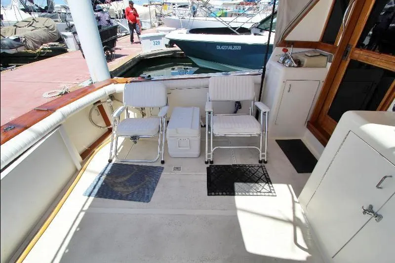  Yacht Photos Pics 1988 Ocean Yachts 38 Super Sport boat deck with chairs and cooler.