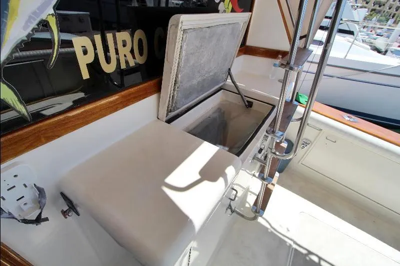  Yacht Photos Pics 1988 Ocean Yachts 38 Super Sport boat interior with open storage compartment.