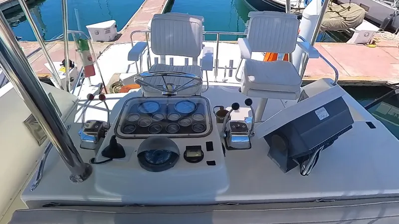 Yacht Photos Pics Cockpit of 1988 Ocean Yachts 38 Super Sport with steering wheel and controls.