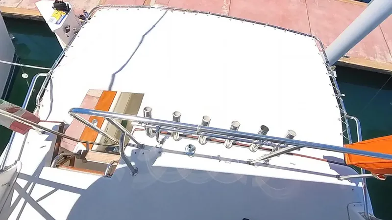  Yacht Photos Pics 1988 Ocean Yachts 38 Super Sport deck view with fishing rod holders.