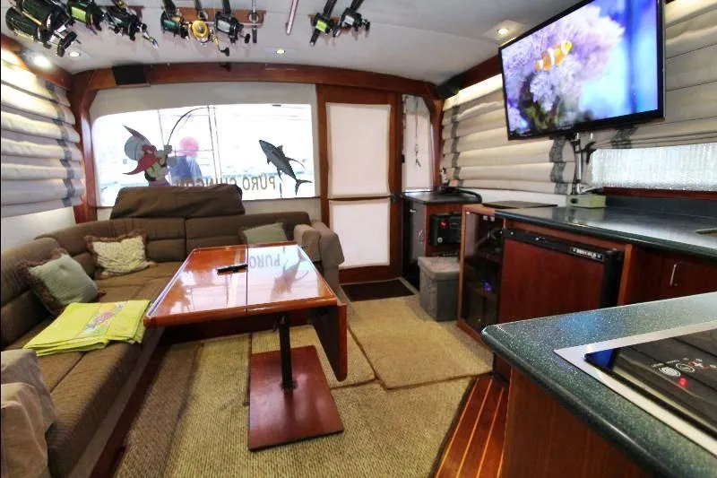  Yacht Photos Pics Interior of 1988 Ocean Yachts 38 Super Sport with cozy seating and modern amenities.