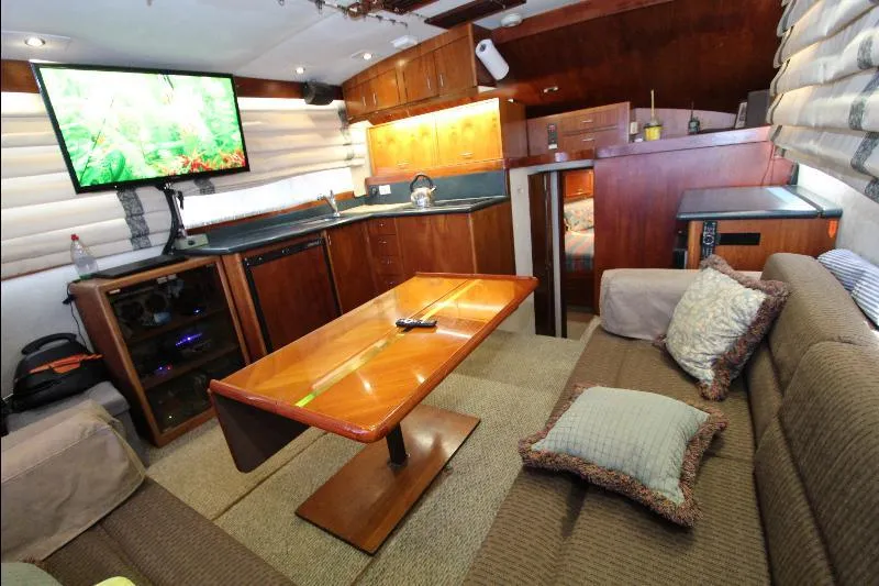  Yacht Photos Pics Luxurious interior of 1988 Ocean Yachts 38 Super Sport with cozy seating and modern amenities.
