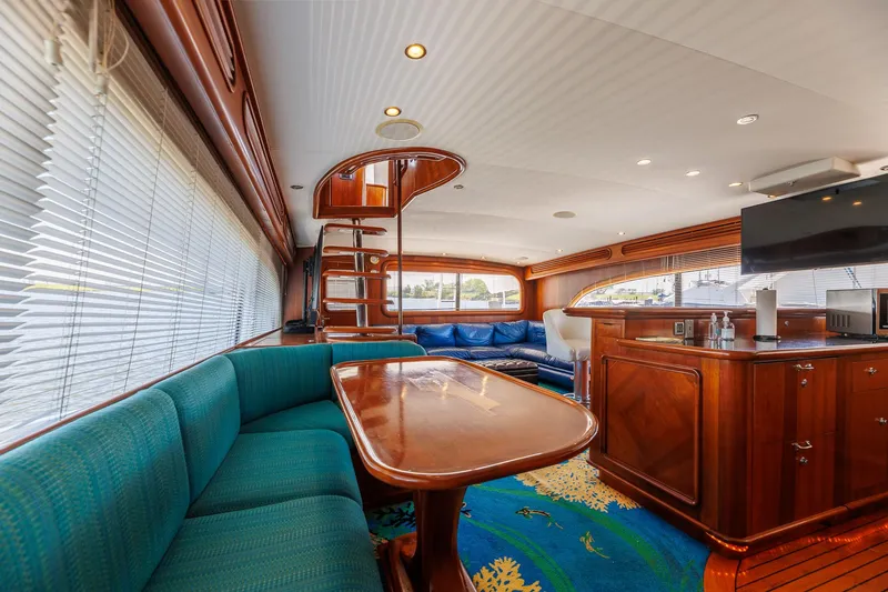 Stress Relief Yacht Photos Pics Luxurious interior of 2003 Tiffany Enclosed Bridge Sportfish yacht with elegant wood finishes.