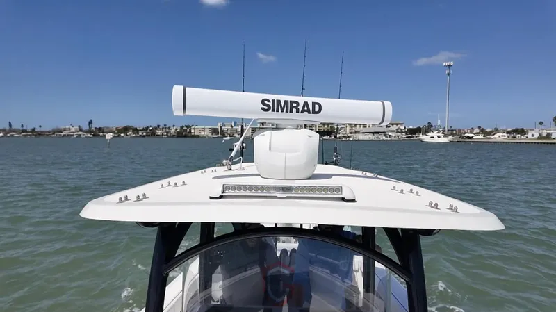  Yacht Photos Pics 2023 CG Boat Works 35 M-Series on water, featuring Simrad radar system.