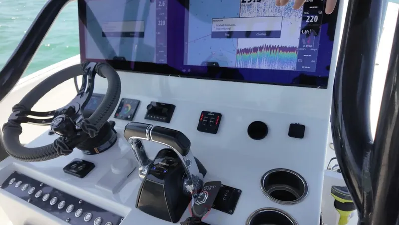  Yacht Photos Pics 2023 CG Boat Works 35 M-Series dashboard with advanced navigation controls and displays.