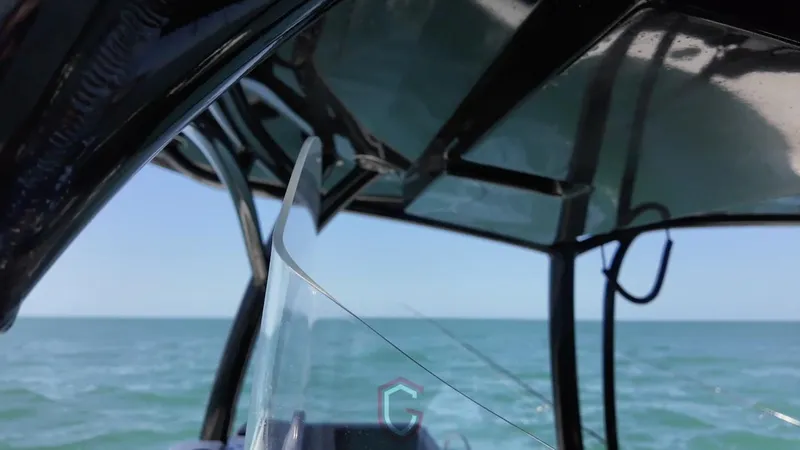  Yacht Photos Pics 2023 CG Boat Works 35 M-Series on open water, showcasing sleek design and clear skies.