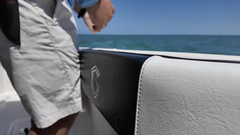  Yacht Photos Pics Man on CG Boat Works 35 M-Series, 2023, enjoying ocean view.