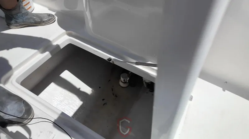  Yacht Photos Pics Open compartment on 2023 CG Boat Works 35 M-Series deck, showing interior details.