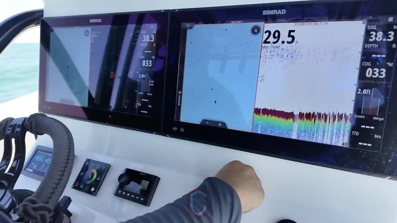  Yacht Photos Pics 2023 CG Boat Works 35 M-Series dashboard with Simrad navigation displays.