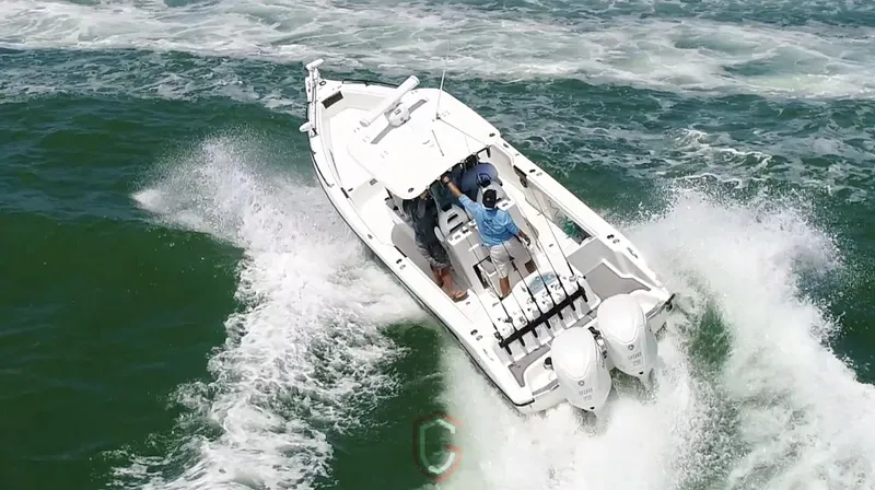  Yacht Photos Pics 2023 CG Boat Works 35 M-Series navigating ocean waves at high speed.