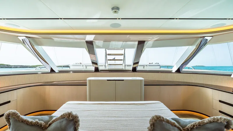 Midnight Saga Yacht Photos Pics Luxurious interior of 2023 Moonen 110 yacht with panoramic ocean views.