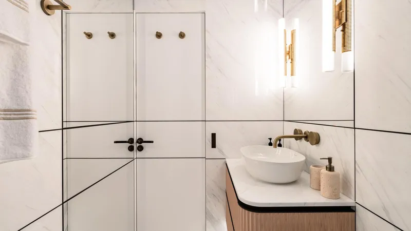 Midnight Saga Yacht Photos Pics Luxurious bathroom in 2023 Moonen 110 yacht with modern fixtures and elegant design.