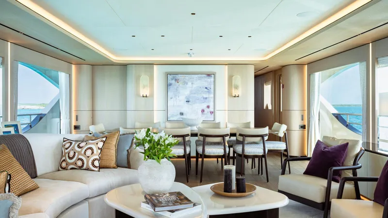 Midnight Saga Yacht Photos Pics Luxurious interior of 2023 Moonen 110 yacht with elegant seating and modern decor.