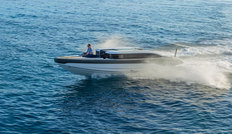  Yacht Photos Pics 2024 Onda 321 LIMO cruising on open water, showcasing sleek design and speed.