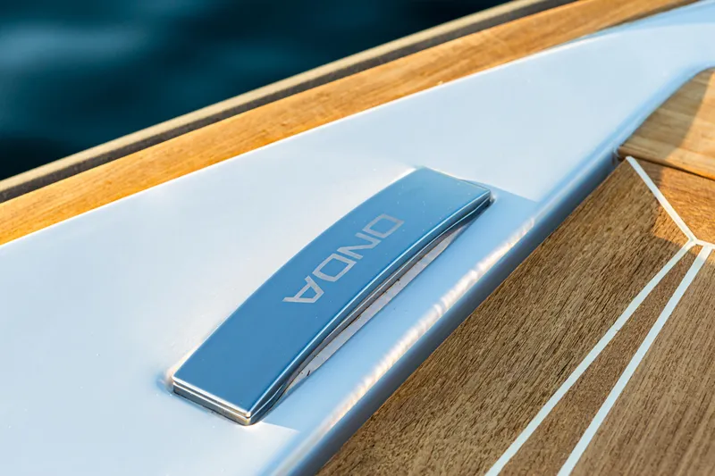  Yacht Photos Pics 2024 Onda 321 LIMO yacht detail with sleek wood and metal design.
