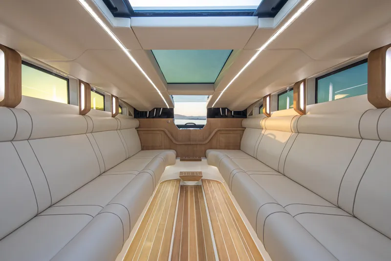  Yacht Photos Pics Luxurious interior of 2024 Onda 321 LIMO with elegant seating and panoramic windows.