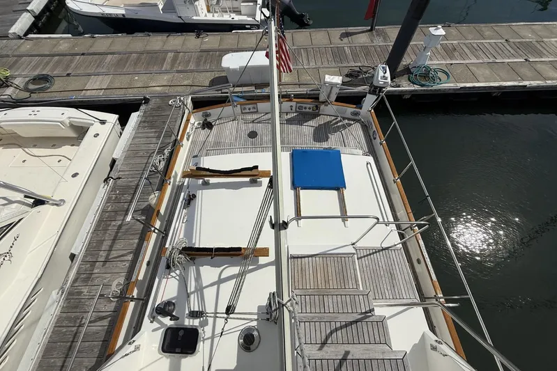  Yacht Photos Pics Overhead view of 1999 Grand Banks 42 Classic yacht docked at marina.
