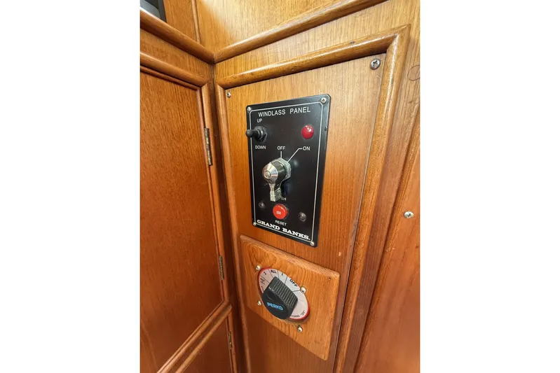  Yacht Photos Pics Windlass control panel on 1999 Grand Banks 42 Classic boat, featuring wooden interior.