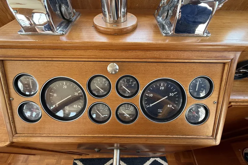  Yacht Photos Pics Dashboard of a 1999 Grand Banks 42 Classic boat with various gauges and controls.